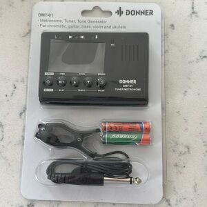 In box Brand New electric instrument tuner & metronome…a musician must have!